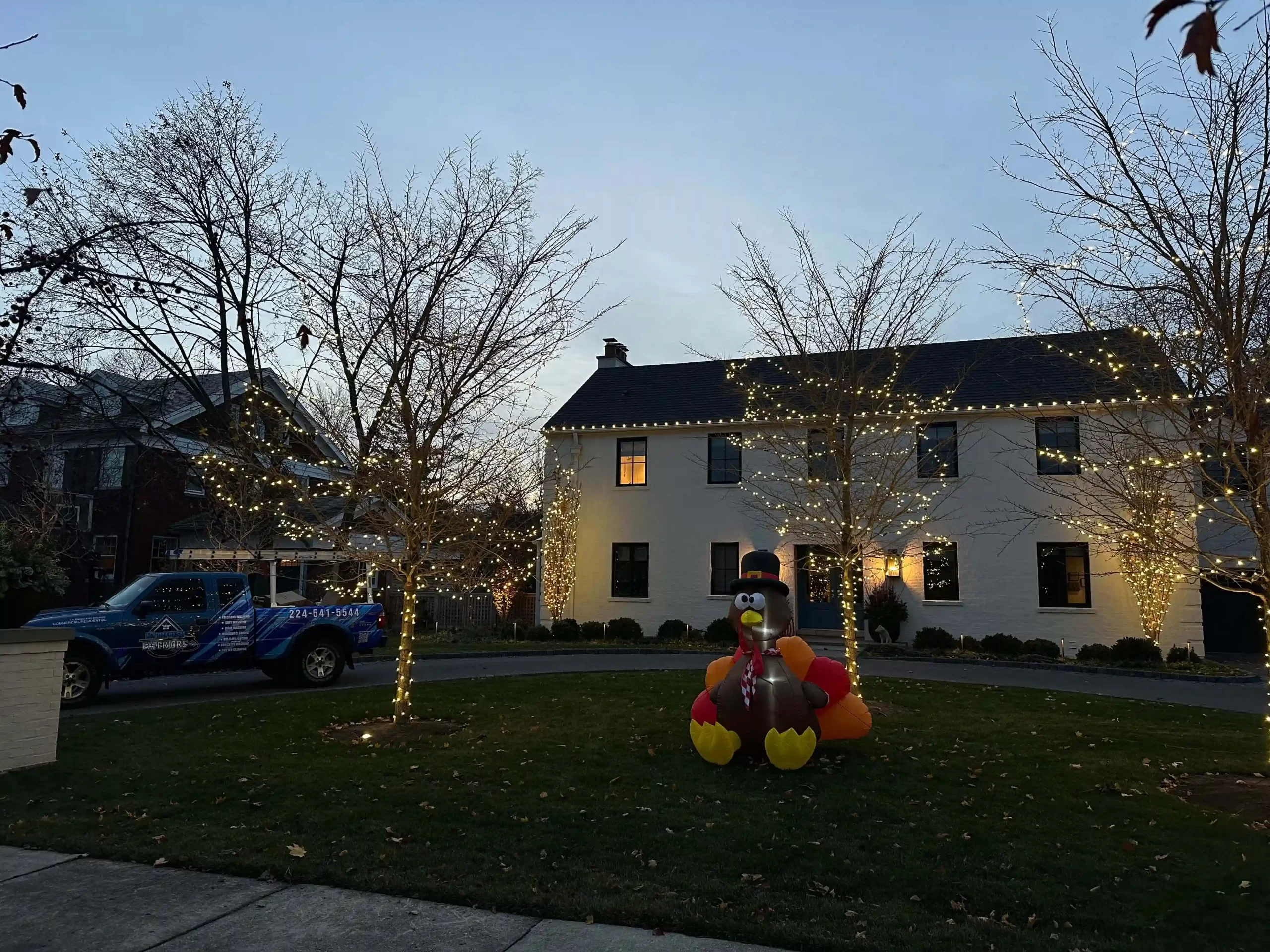 Holiday lights installation – roofline and entry accent